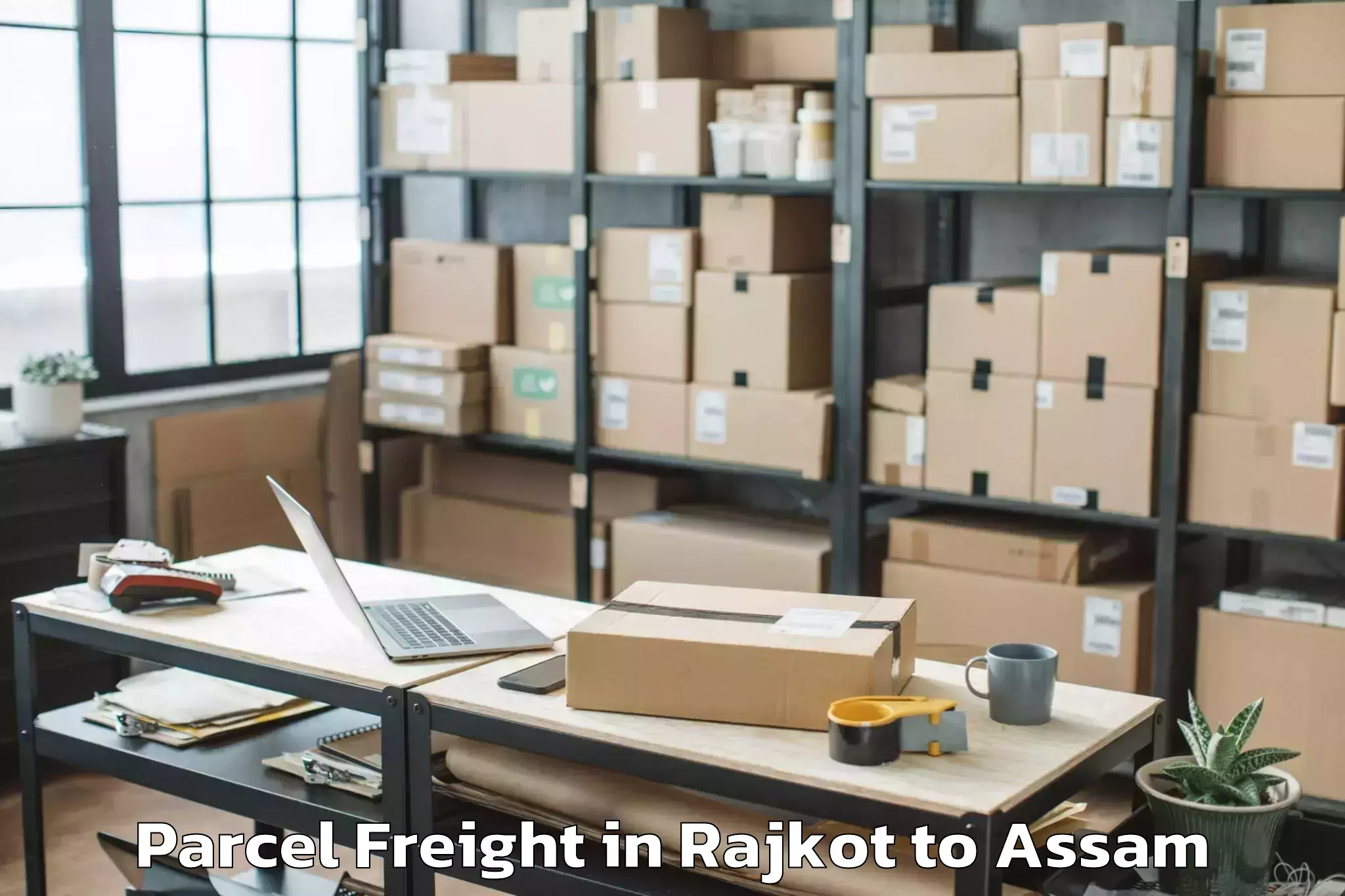 Book Rajkot to Biswanath Charali Parcel Freight Online